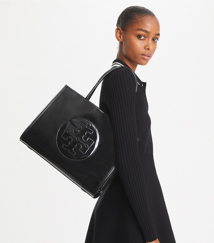Tory Burch designer borse shopping Shopping Ella Bio piccola in pelle verniciata in Black accessory on model