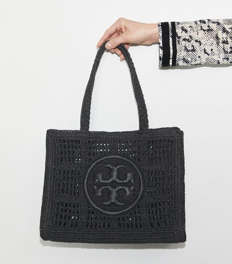 Tory Burch designer borse shopping Shopping Ella grande lavorata a mano a uncinetto in Black accessory on model