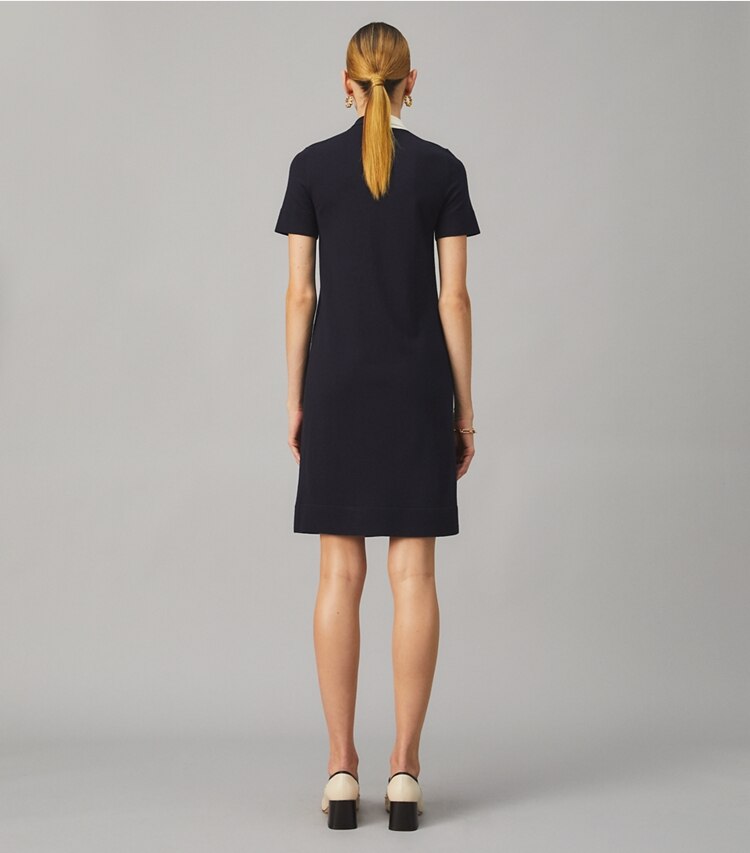 Tory Burch designer dresses Short Sleeve Bow Sweater Dress in Medium Navy/New Ivory on model back