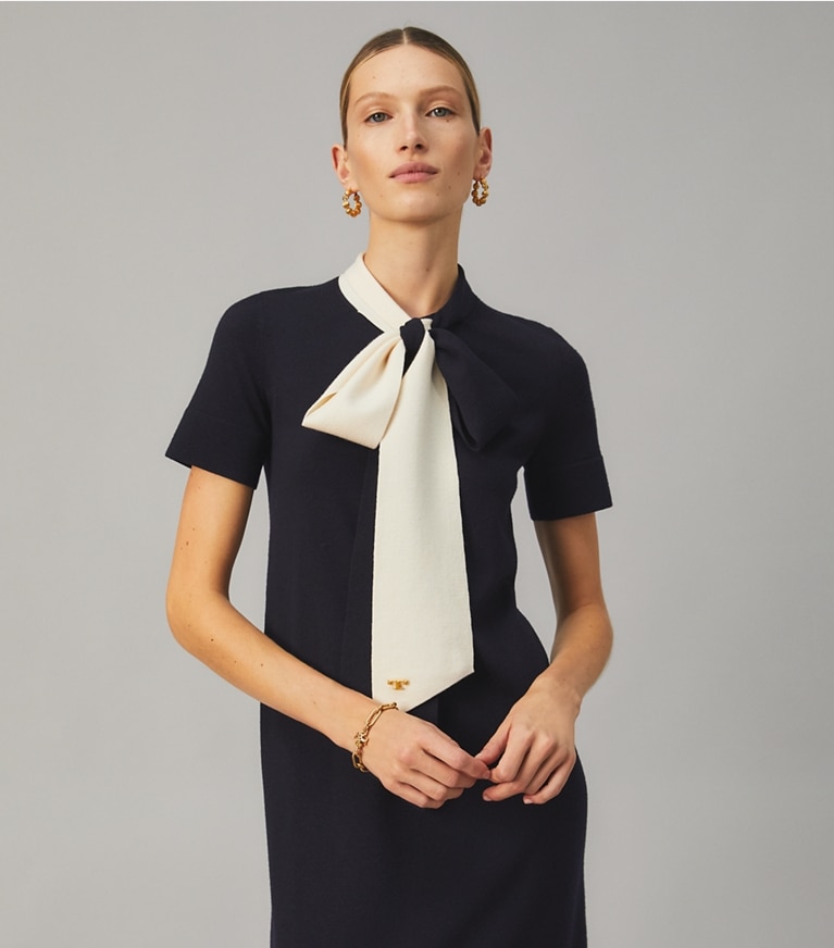 Tory Burch designer dresses Short Sleeve Bow Sweater Dress in Medium Navy/New Ivory front