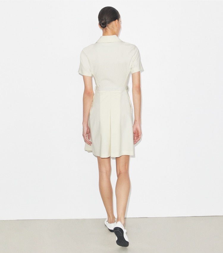 Tory Burch designer dresses Short-Sleeve Pleated Golf Dress in NEW IVORY on model back