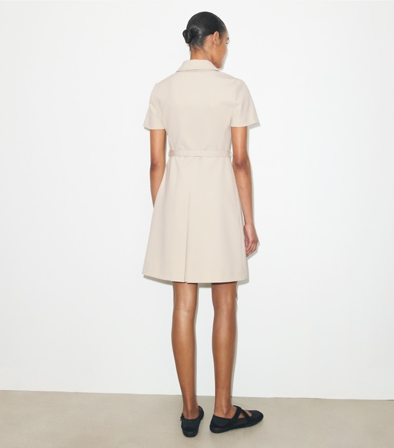 Tory Burch designer dresses Short-Sleeve Pleated Golf Dress in Stone on model back