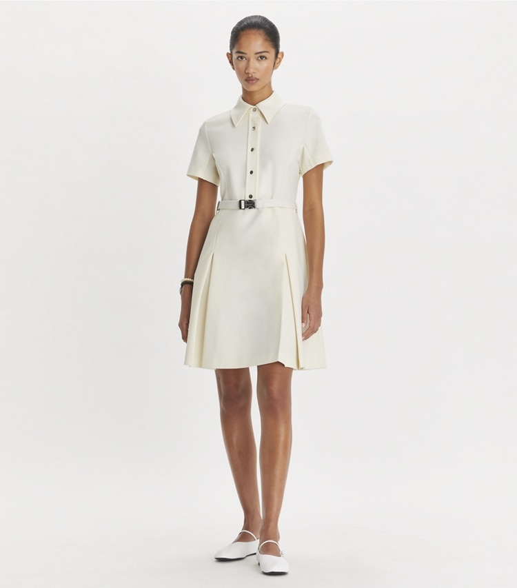 Tory Burch designer dresses Short-Sleeve Pleated Golf Dress in NEW IVORY on model front