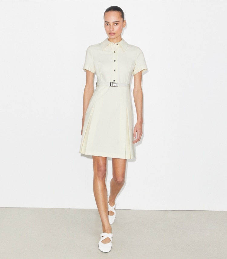 Tory Burch designer dresses Short-Sleeve Pleated Golf Dress in NEW IVORY on model front