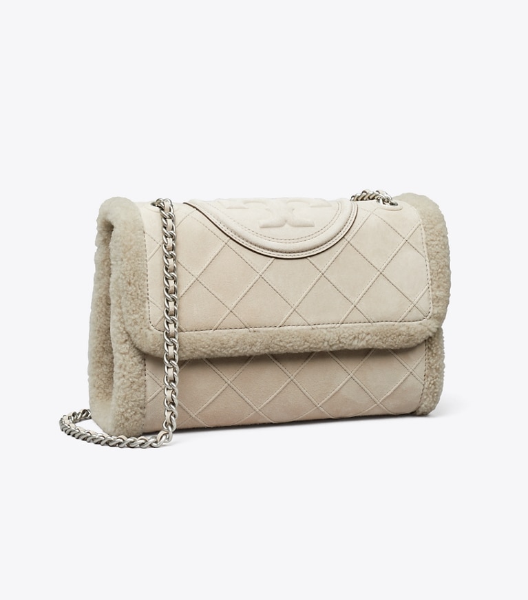 Tory Burch designer borse a tracolla Shoulder bag convertibile Fleming morbida in shearling in Cotton Grey angle