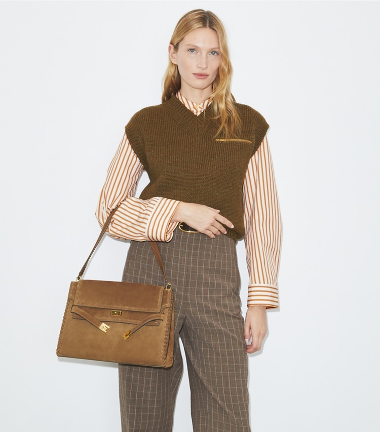 Tory Burch designer borse a tracolla Shoulder bag grande Lee Radziwill in suede in WILD TABACCO accessory on model