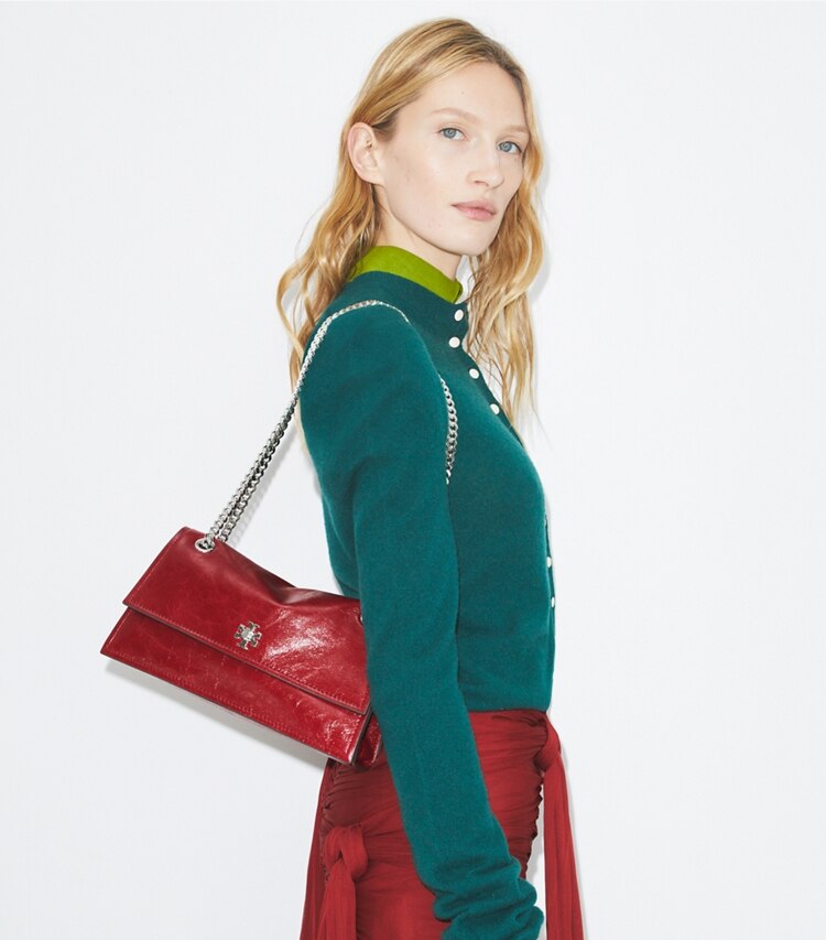 Tory Burch designer borse a tracolla Shoulder bag Kira con dettaglio a girello in Red accessory on model