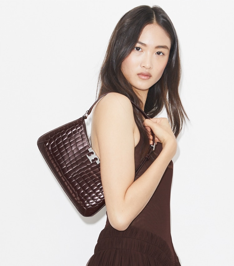 Tory Burch designer borse a tracolla Shoulder bag sottile Eleanor con rilievo coccodrillo in Deep Burgundy accessory on model