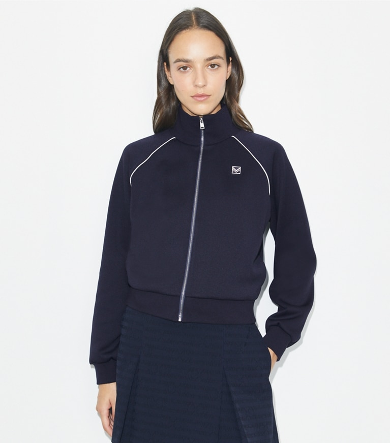 Tory Burch designer jackets Shrunken Raglan Track Jacket in Medium Navy front