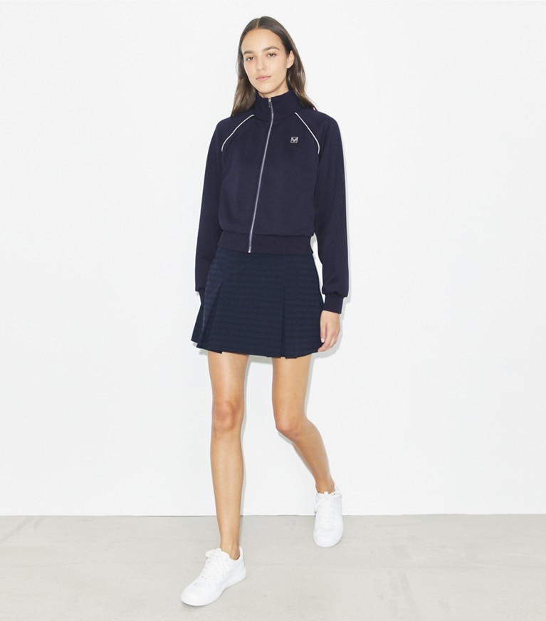 Tory Burch designer jackets Shrunken Raglan Track Jacket in Medium Navy front