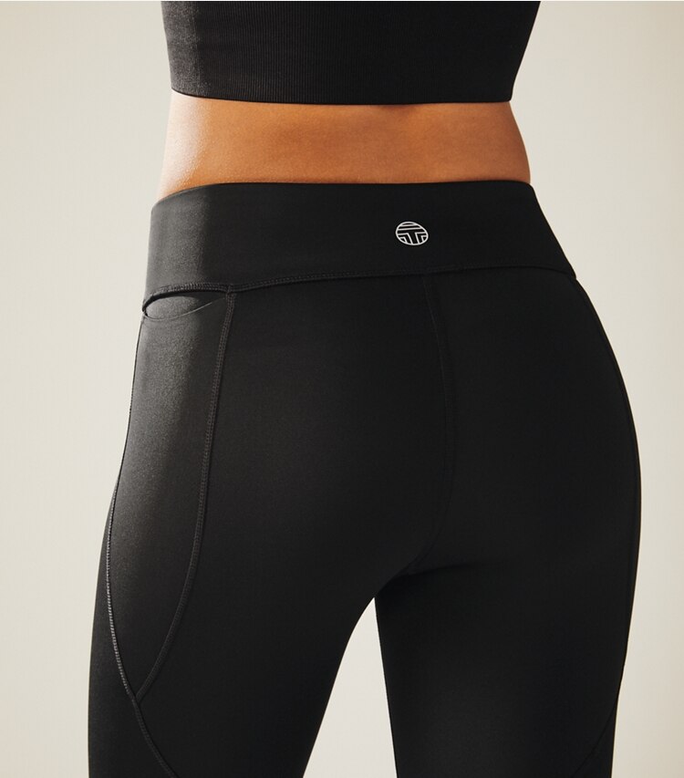 Tory Sport designer bottoms Side-Pocket Chevron Leggings in Sport Black on model detail