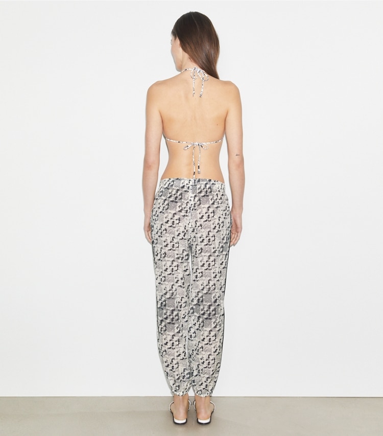 Tory Burch designer coverups Silk Beach Pant in New Ivory Distressed Pixelated Logo on model back