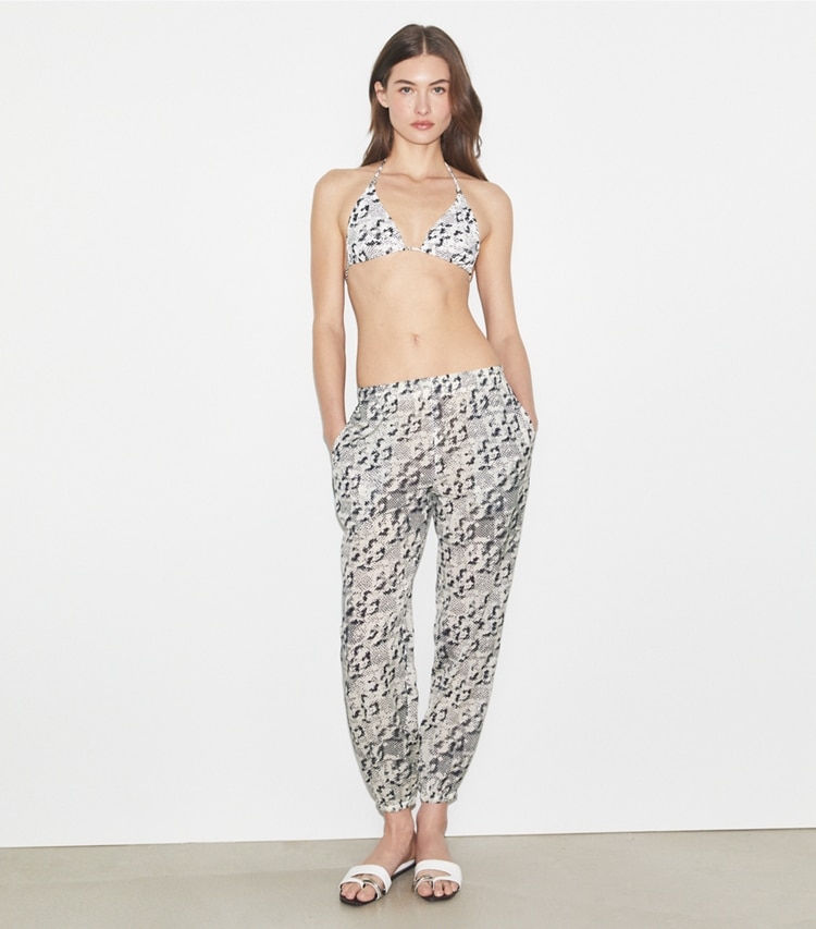 Tory Burch designer coverups Silk Beach Pant in New Ivory Distressed Pixelated Logo on model front