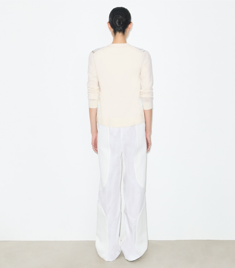 Tory Burch designer セーター シルクフロント カーディガン in New Ivory / Neutral Pool on model back