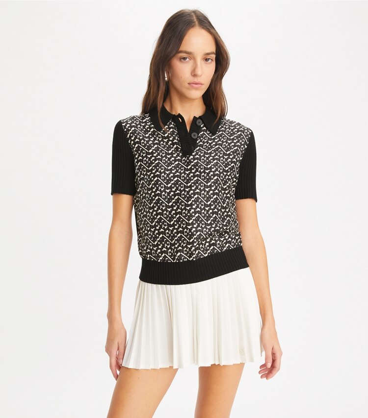 Tory Burch designer トップス シルクフロント ポロシャツ in Black / Black Prismatic Small T Monogram on model detail