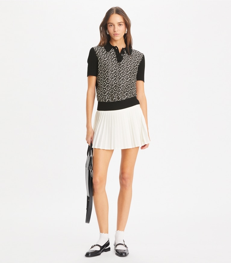 Tory Burch designer トップス シルクフロント ポロシャツ in Black / Black Prismatic Small T Monogram front