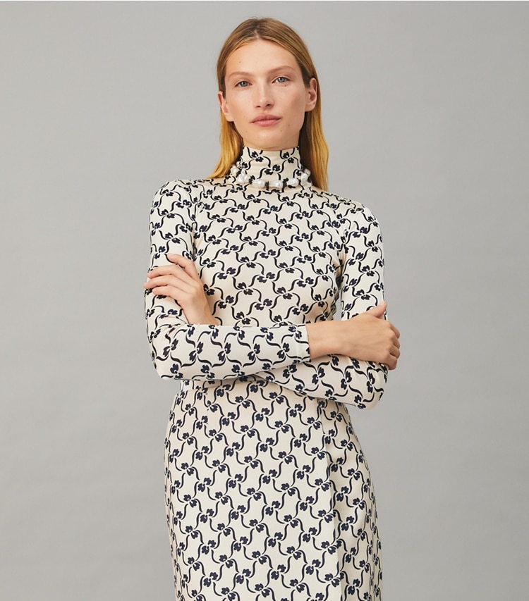 Tory Burch designer tops Silk Jersey Turtleneck in NAVY STENCIL FLORAL on model detail