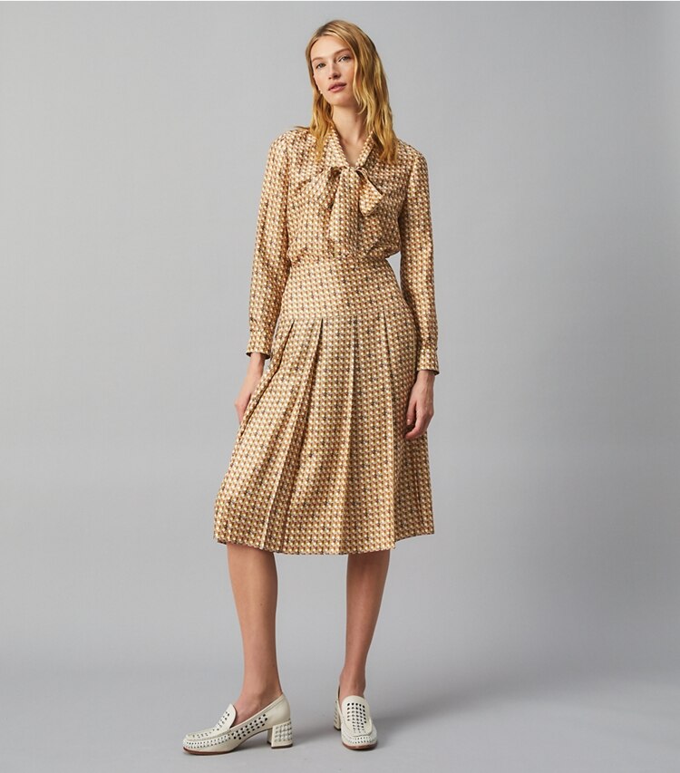 Tory Burch designer bottoms Silk Twill Carmine Skirt in BUTTERMILK BASKETWEAVE on model front
