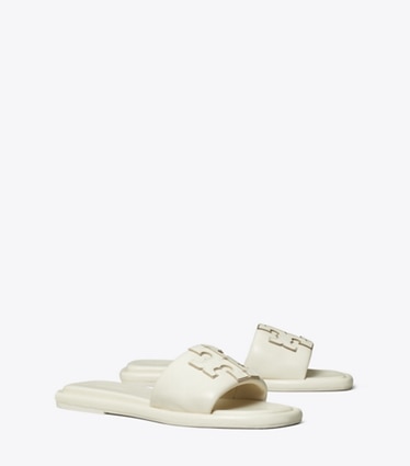 Tory Burch designer sandali Slider sportiva con doppia T in LIGHT CREAM / GOLD angle