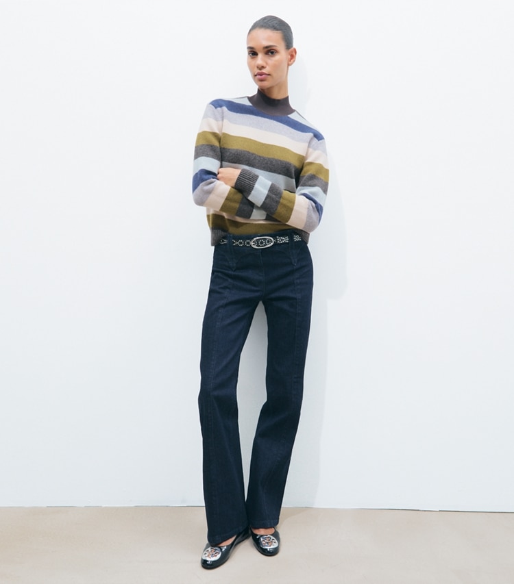 Tory Burch designer bottoms Slim Leg Jean in Rinse Wash on model front