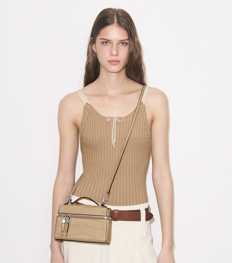 Tory Burch designer crossbody bags Slim Romy Croc-Embossed Top Handle Bag in Light Hickory accessory on model