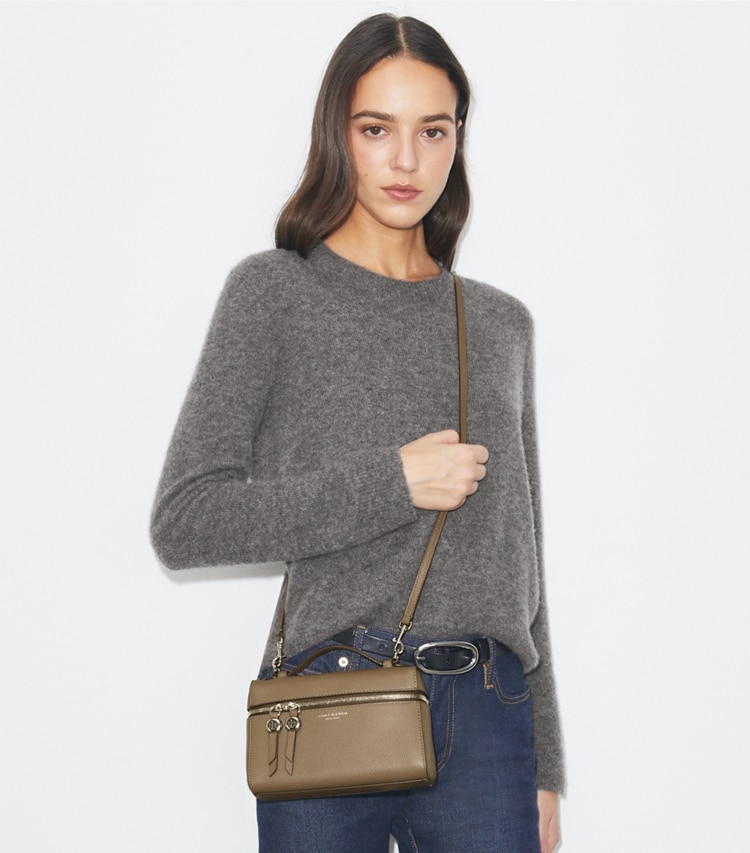 Tory Burch designer crossbody bags Slim Romy Top Handle Bag in Wild Mushroom accessory on model