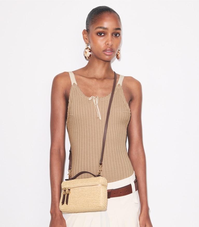 Tory Burch designer crossbody bags Slim Romy Woven Top Handle Bag in Natural accessory on model
