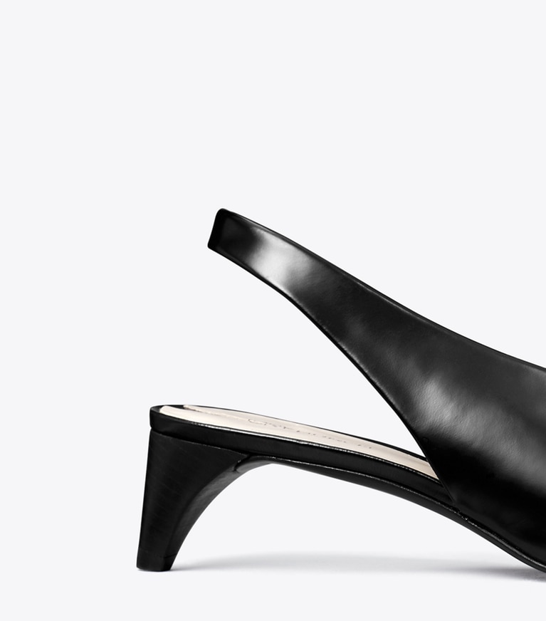 Tory Burch designer heels Slingback mit Absatz und Piercing-Detail in PERFECT BLACK angle