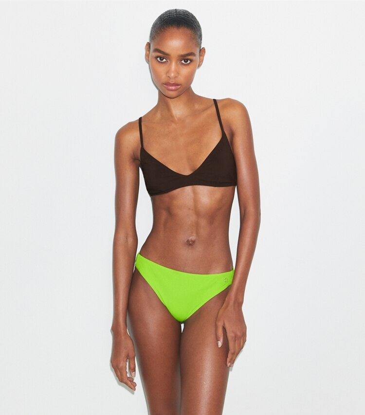 Tory Burch designer bikini Slip per bikini in Vivid Lime on model detail