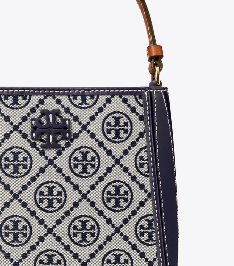 Tory Burch designer クロスボディバッグ マックグロー Tモノグラム スモールバケットバッグ in Tory Navy angle