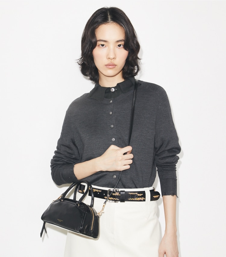 Tory Burch designer crossbody bags Small Bowler in Black accessory on model