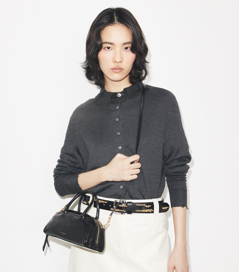 Tory Burch designer crossbody bags Small Bowler in Black accessory on model