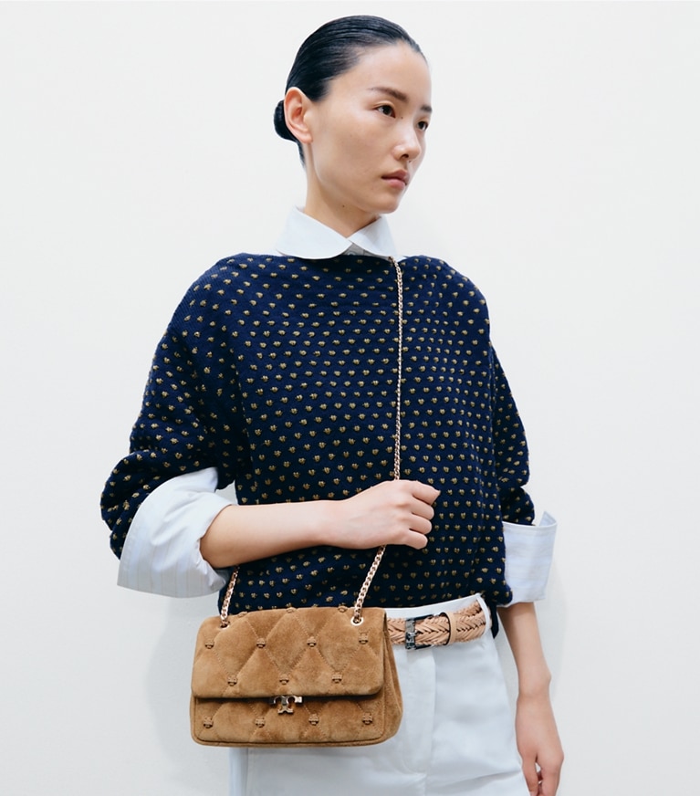 Tory Burch designer shoulder bags Small Bunny Knot Suede Shoulder Bag in Toffee additional on model