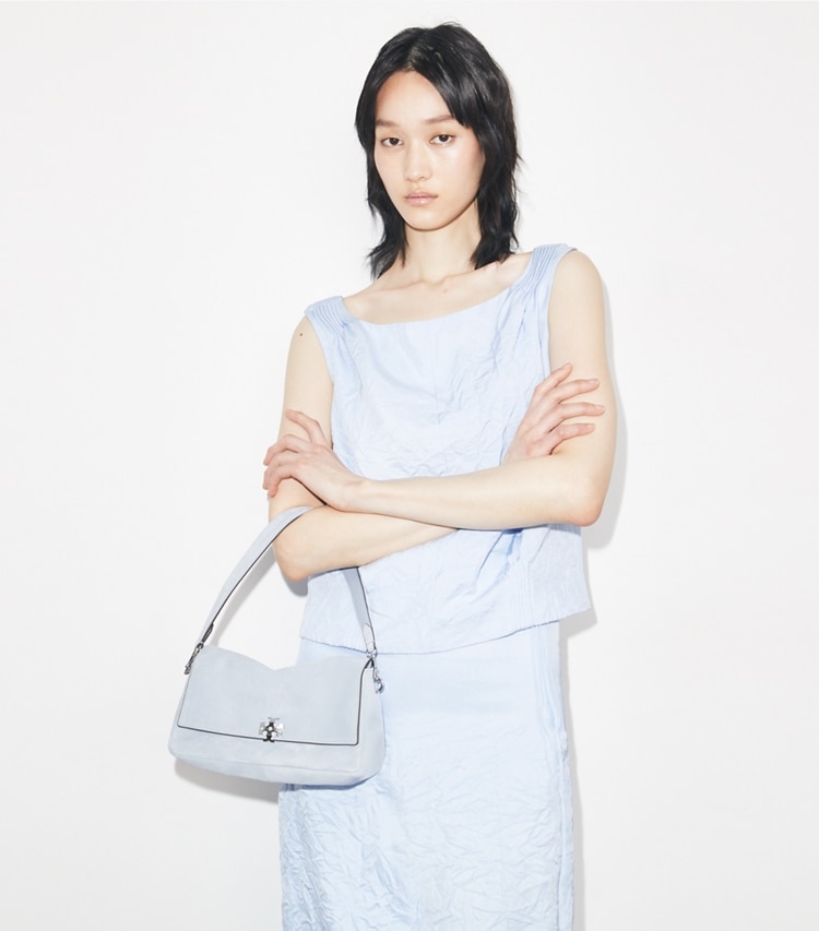 Tory Burch designer shoulder bags Small Charlie Suede Shoulder Bag in Light Blue accessory on model