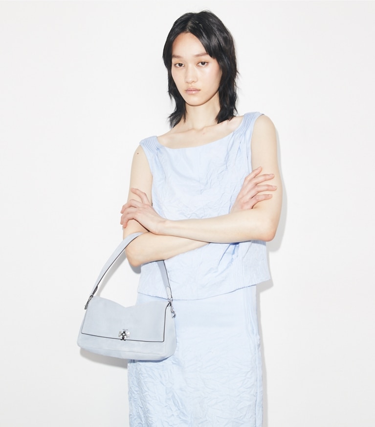 Tory Burch designer shoulder bags Small Charlie Suede Shoulder Bag in Light Blue accessory on model
