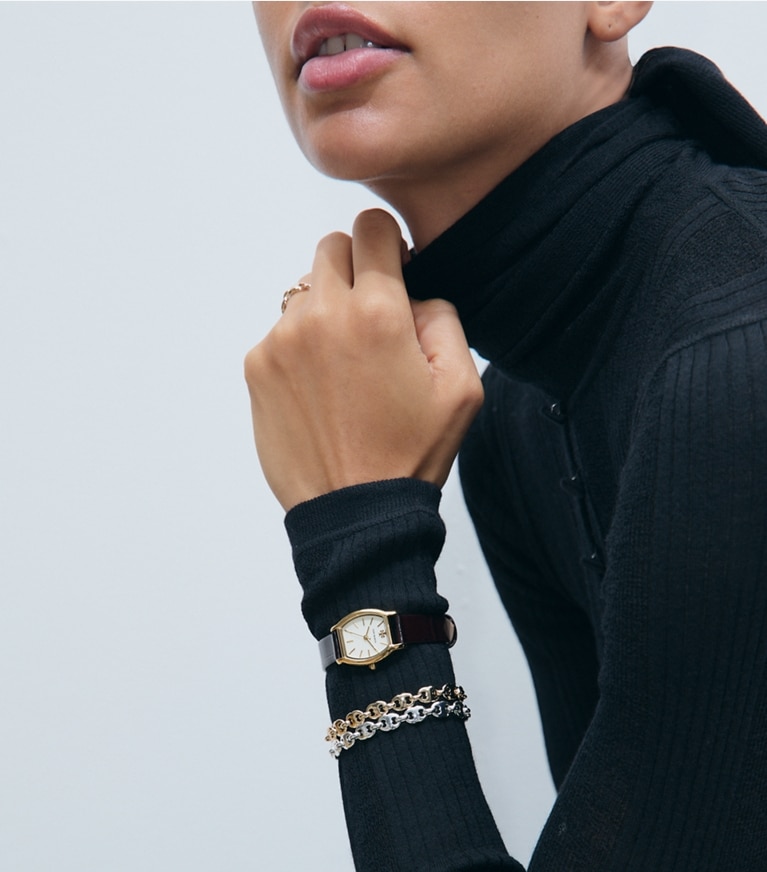 Tory Burch diseñador relojes con correa Small Eleanor Curve Watch en IVORY/GOLD/BLACK CROC accesorio en modelo