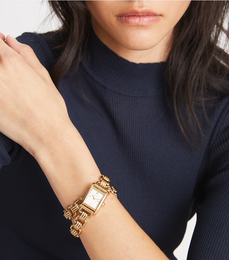 Tory Burch designer ストラップウォッチ エレノア ウォッチ ゴールドトーン／ステンレススチール 19 x 28mm in IVORY/GOLD accessory on model