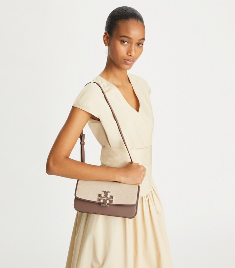 https://s7.toryburch.com/is/image/ToryBurch/style/small-eleanor-rectangular-bag-accessory-on-model.TB_153005_093_20230509_OMACC.pdp-750x853.jpg