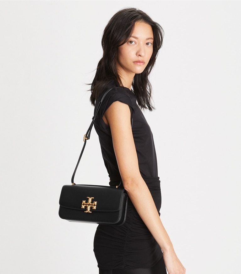 Tory burch black store purse with gold chain