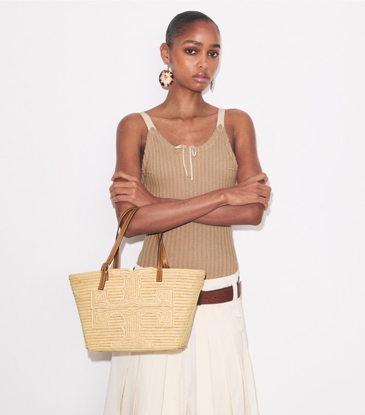 Tory Burch designer tote bags Small Ella Handwoven Raffia Tote in Natural accessory on model