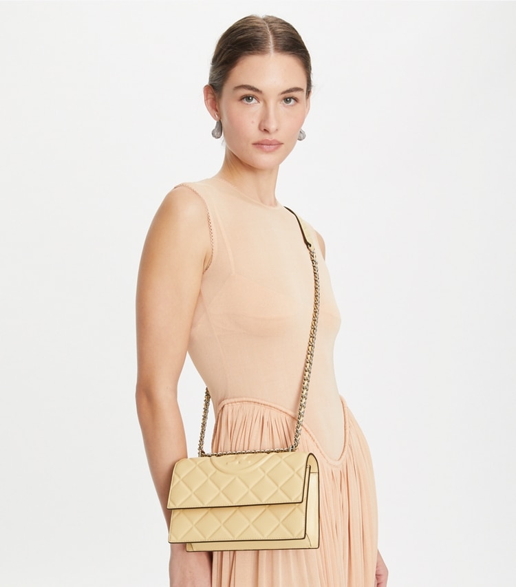 Tory Burch designer shoulder bags Small Fleming Convertible Shoulder Bag in Vanilla Soft Serve accessory on model