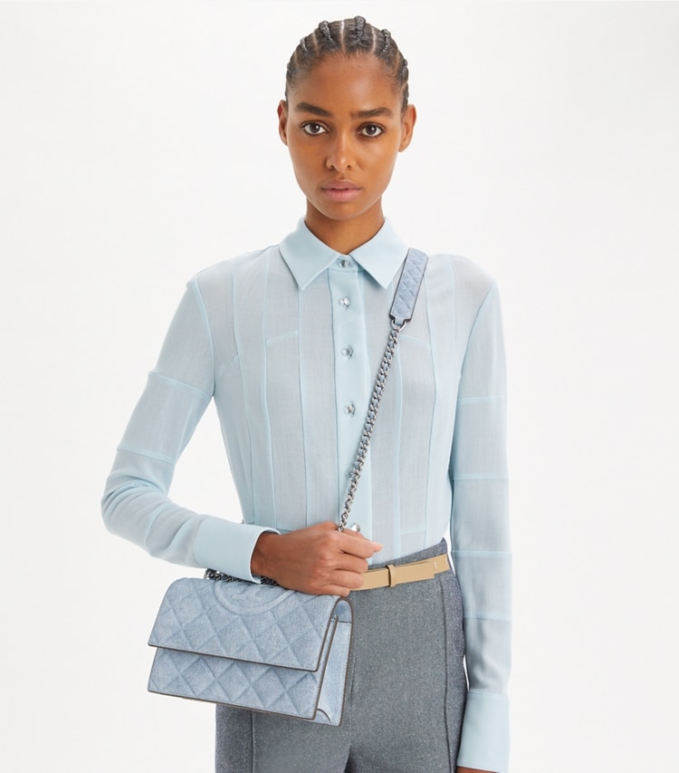 Tory Burch designer shoulder bags Small Fleming Denim-Print Suede Shoulder Bag in Medium Wash Denim additional on model