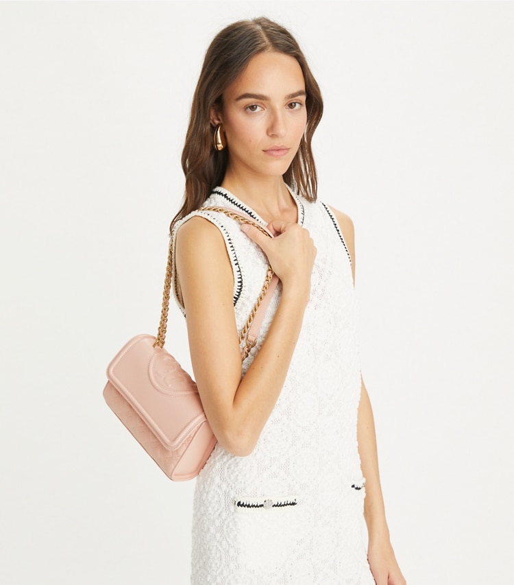 Tory Burch designer shoulder bags Small Fleming Polished-Grain Convertible Shoulder Bag in Pink Dawn accessory on model
