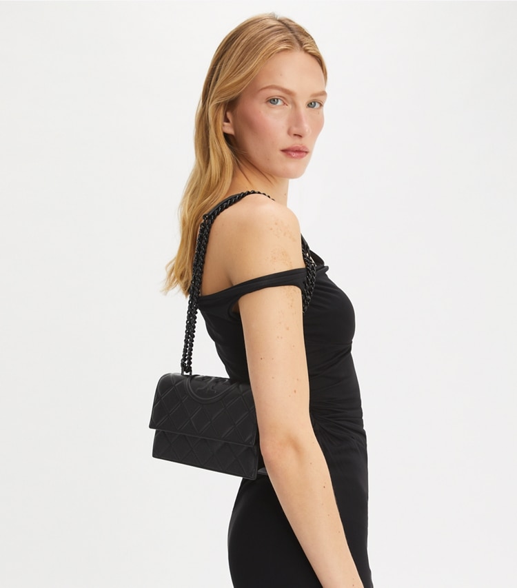Tory Burch designer shoulder bags Small Fleming Polished-Grain Convertible Shoulder Bag in Black/Black accessory on model
