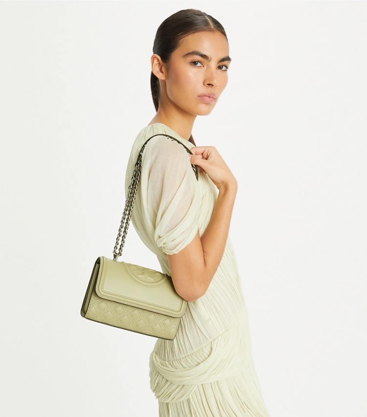 Tory Burch designer shoulder bags Small Fleming Shoulder Bag in Olive Sprig accessory on model