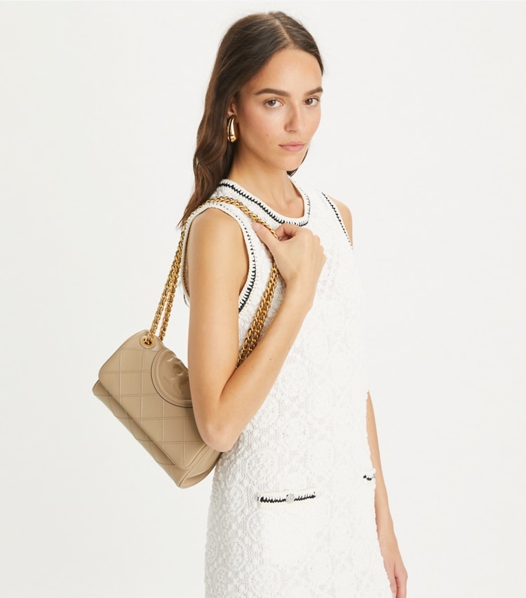 Tory Burch designer shoulder bags Small Fleming Soft Convertible Shoulder Bag in Fresh Clay accessory on model