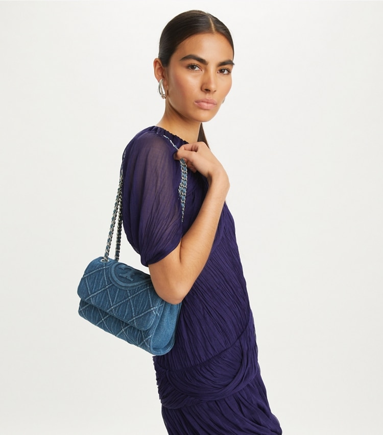 Tory Burch designer shoulder bags Small Fleming Soft Denim Convertible Shoulder Bag in Denim accessory on model