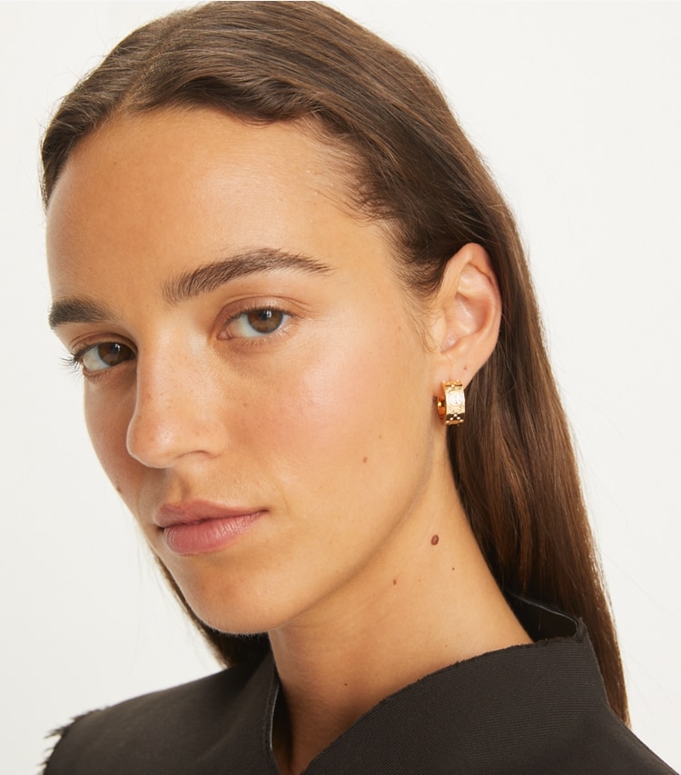 Tory Burch designer earrings Small Icon T Monogram Pavé Hoop Earrings in Tory Gold / Crystal accessory on model