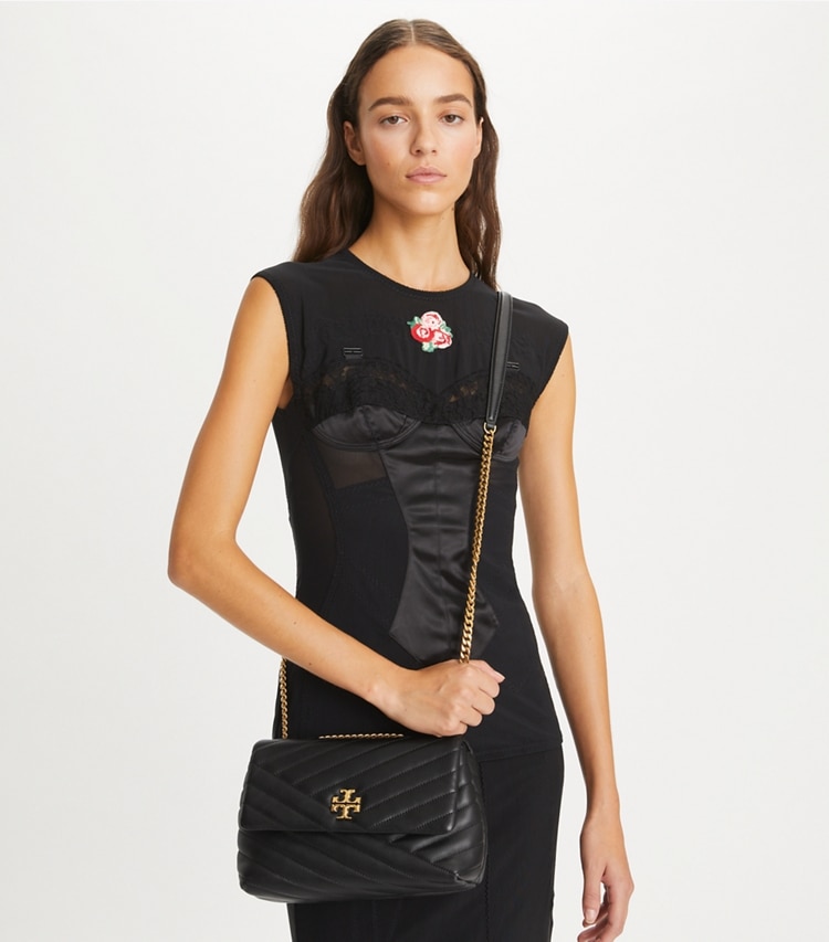 Tory Burch designer shoulder bags Small Kira Chevron Convertible Shoulder Bag in Black additional on model