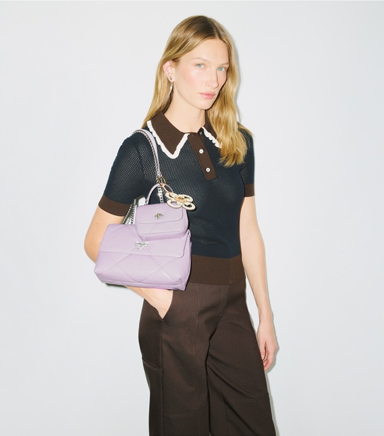 Tory Burch designer shoulder bags Small Kira Diamond Quilt Convertible Shoulder Bag in Purple Heather accessory on model